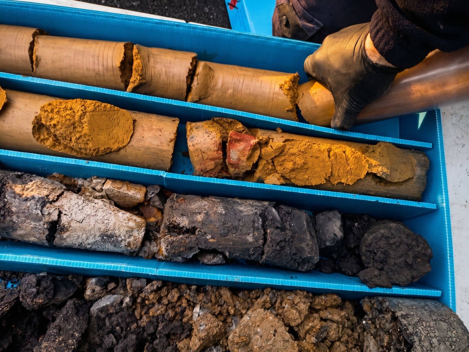 Core box from a borehole showing the different soil layers